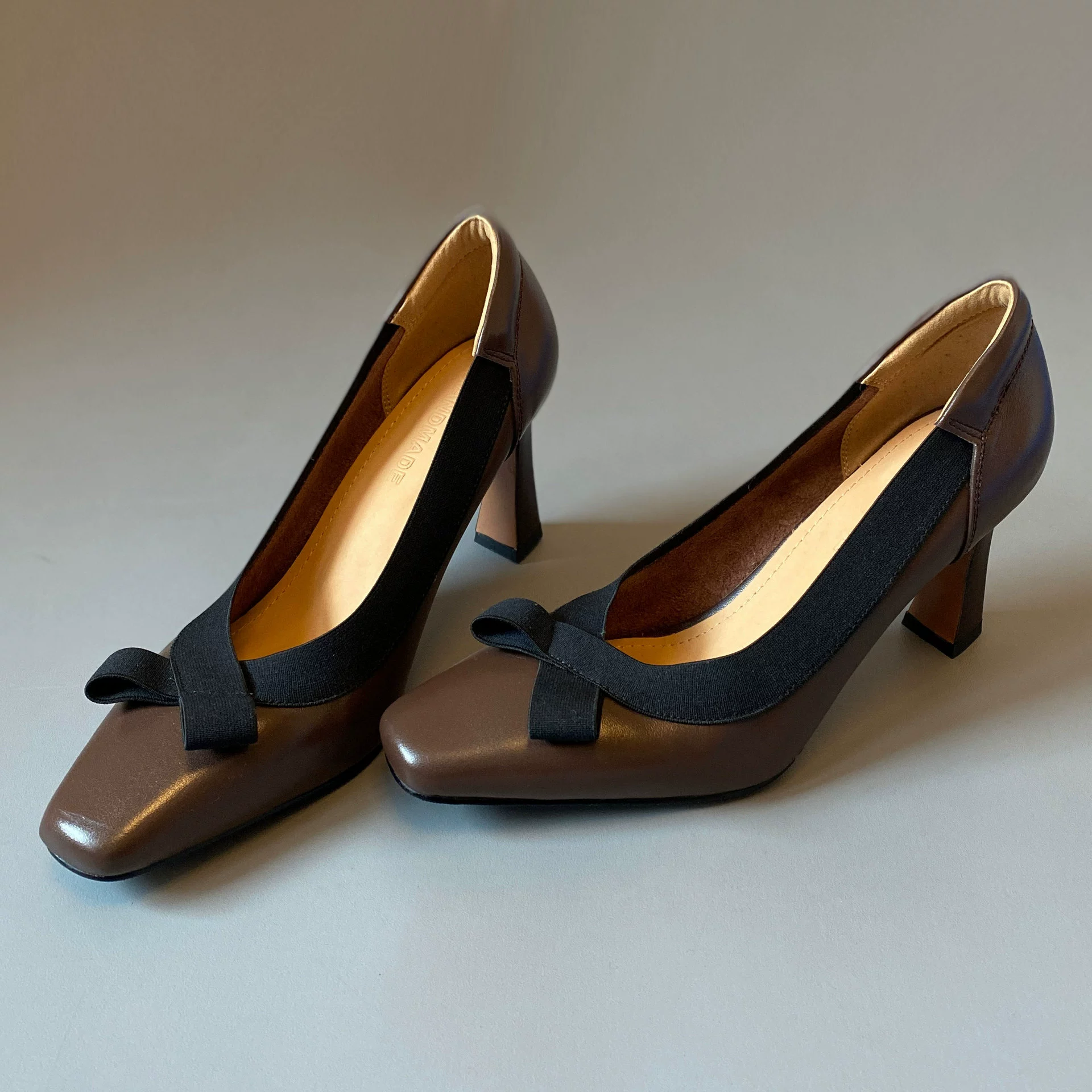 Talons aiguilles en cuir souple à nœud et bout carré pour femme, chaussures à talon haut de luxe · MOHE China shoe factory